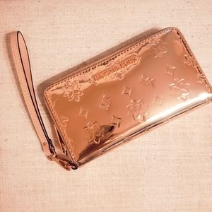 Michael Kors rose gold wallet/ wristlet